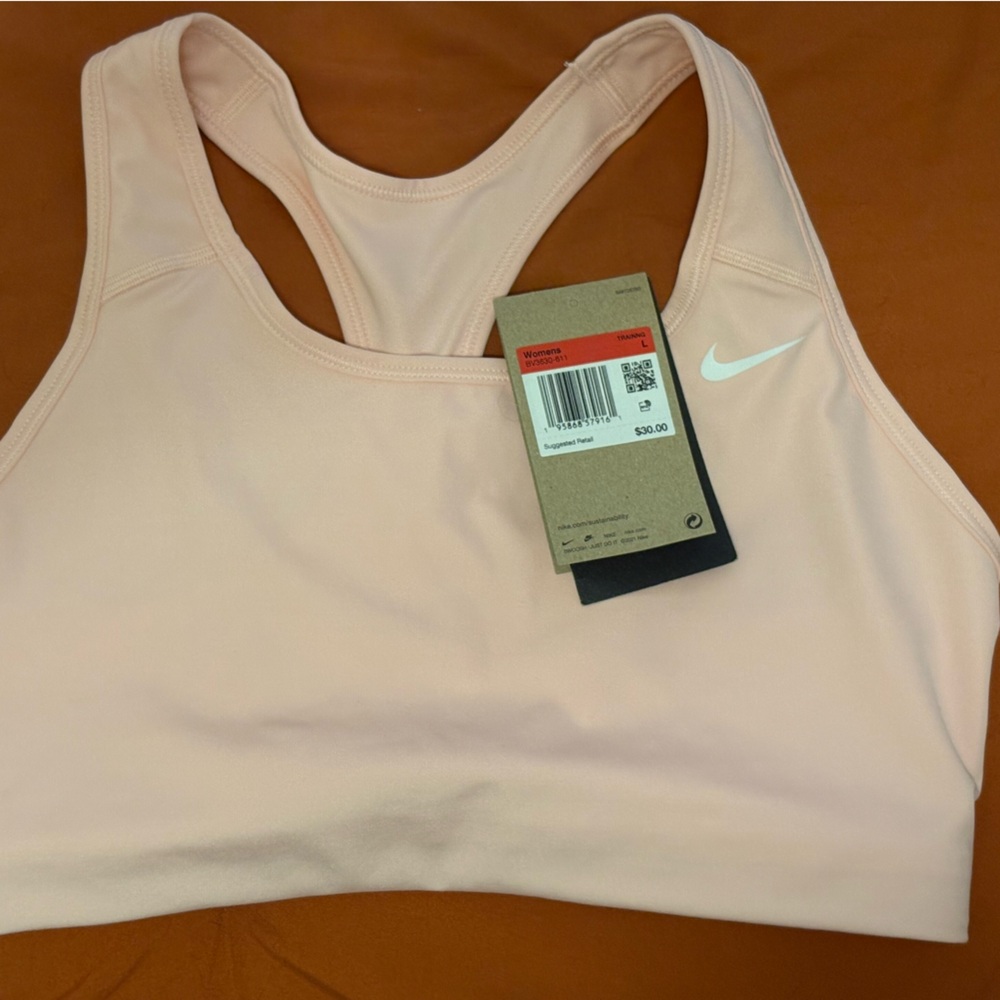 Nike Light Pink swoosh sports bra. Size large. Brand NWT $20